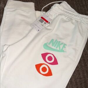 Nike men’s  White Sweatpants with Teal and Pink Accents